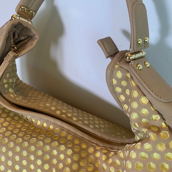 Charming Charlie Tan and Yellow Buttercup perforated Hobo Handbag - Picture 4 of 10